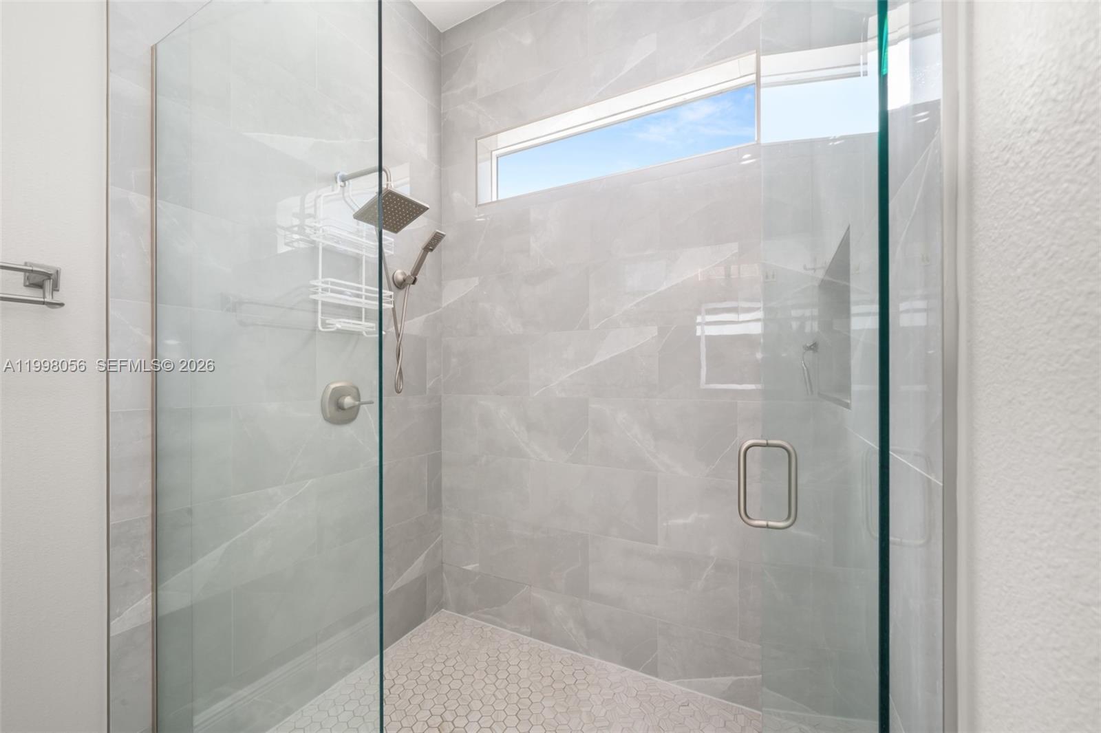 2009 Flower Sebring, FL 33875 - Photo 29 of 61 a bathroom with a shower