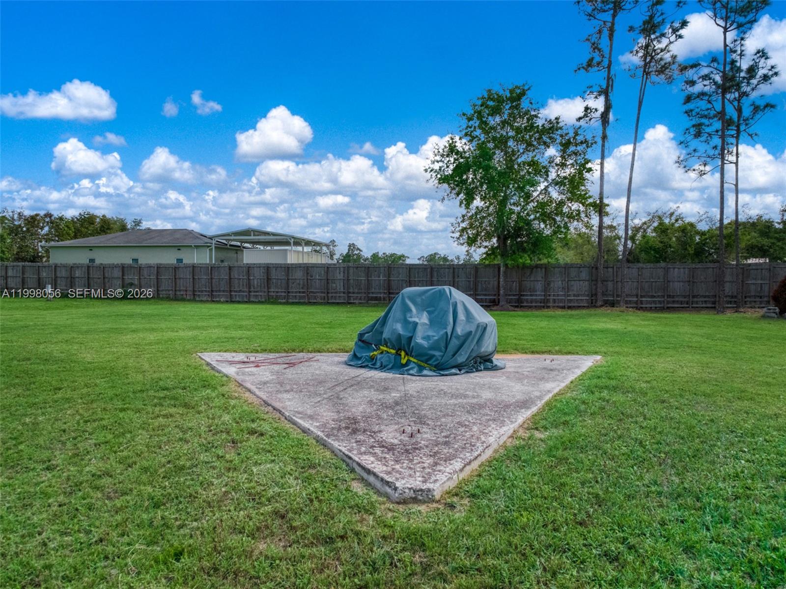 2009 Flower Sebring, FL 33875 - Photo 50 of 61 a view of a backyard