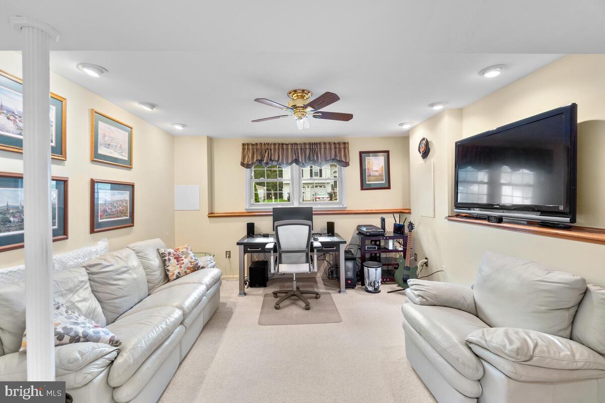 312 Cheyenne Drive Frederick, MD 21701 - Photo 27 of 43 Lower level rec room with TV mount