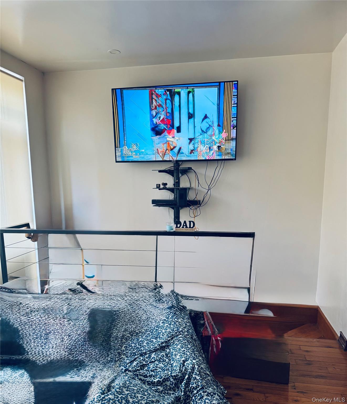 179 Monroe Street, Unit 1A Brooklyn, NY 11216 - Photo 8 of 8 a view of living room with furniture and wooden floor