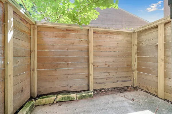 a view of a swimming pool with a yard