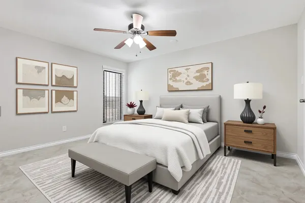 a bedroom with bed and window