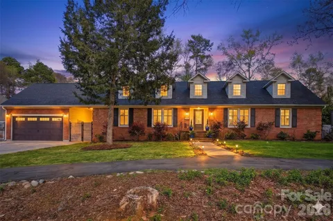 a view of a building with a yard