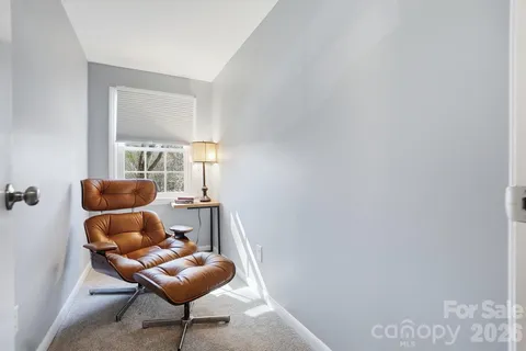 a room with furniture and natural light
