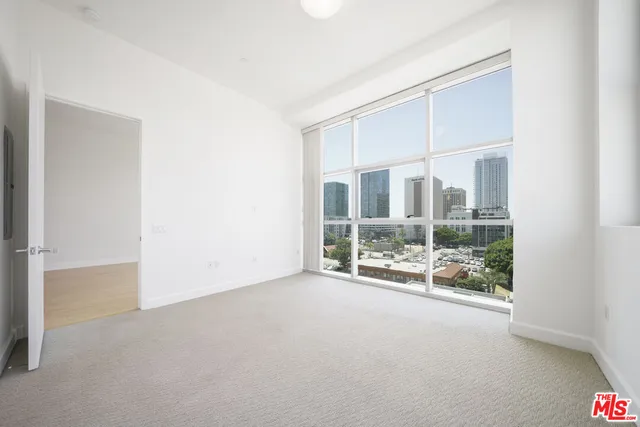 en empty room with windows