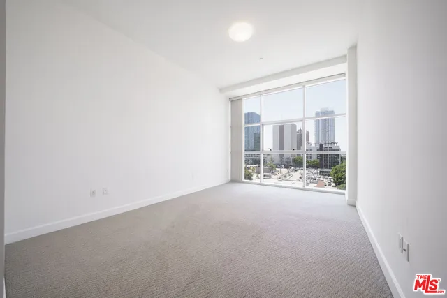 an empty room with a sliding door