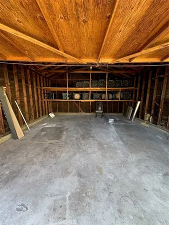 a view of a room with wooden walls