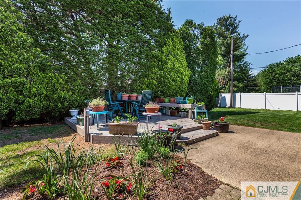 653 Lloyd Road Aberdeen, NJ 07747 - Photo 18 of 18 a view of a backyard with sitting area