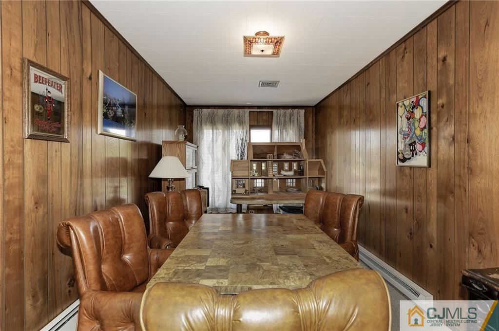 653 Lloyd Road Aberdeen, NJ 07747 - Photo 10 of 18 a living room with furniture