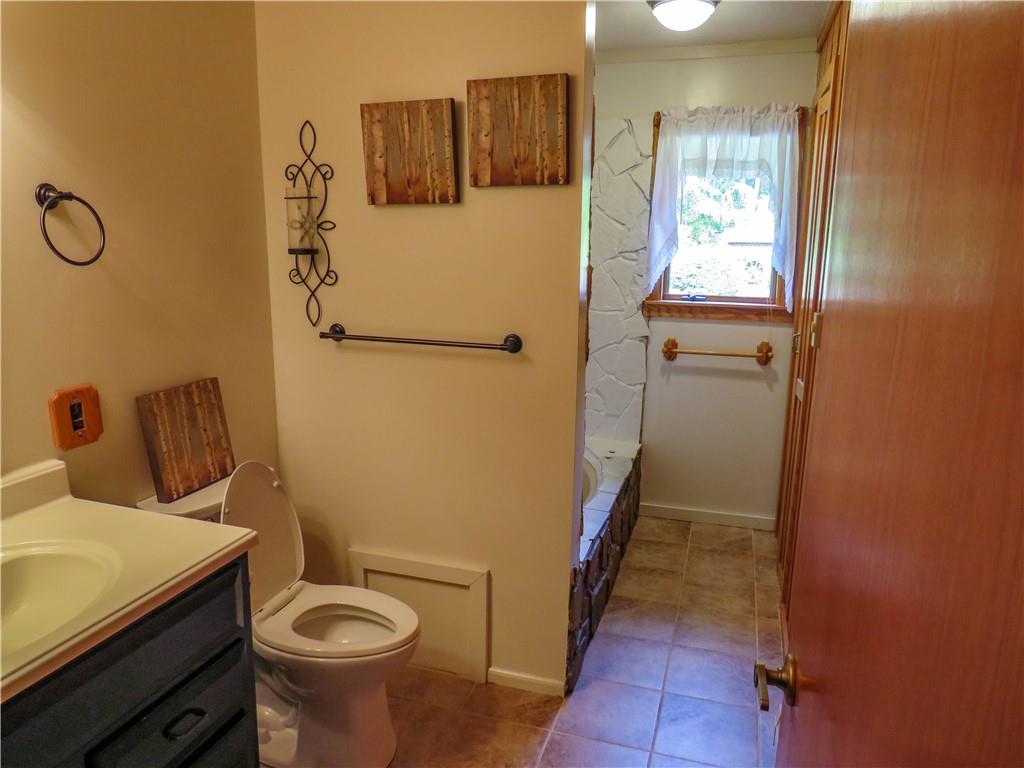 414 Dark Hollow Road Confluence, PA 15424 - Photo 13 of 25 a bathroom with a sink and toilet