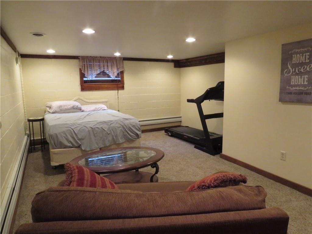 414 Dark Hollow Road Confluence, PA 15424 - Photo 19 of 25 a living room with furniture and a rug
