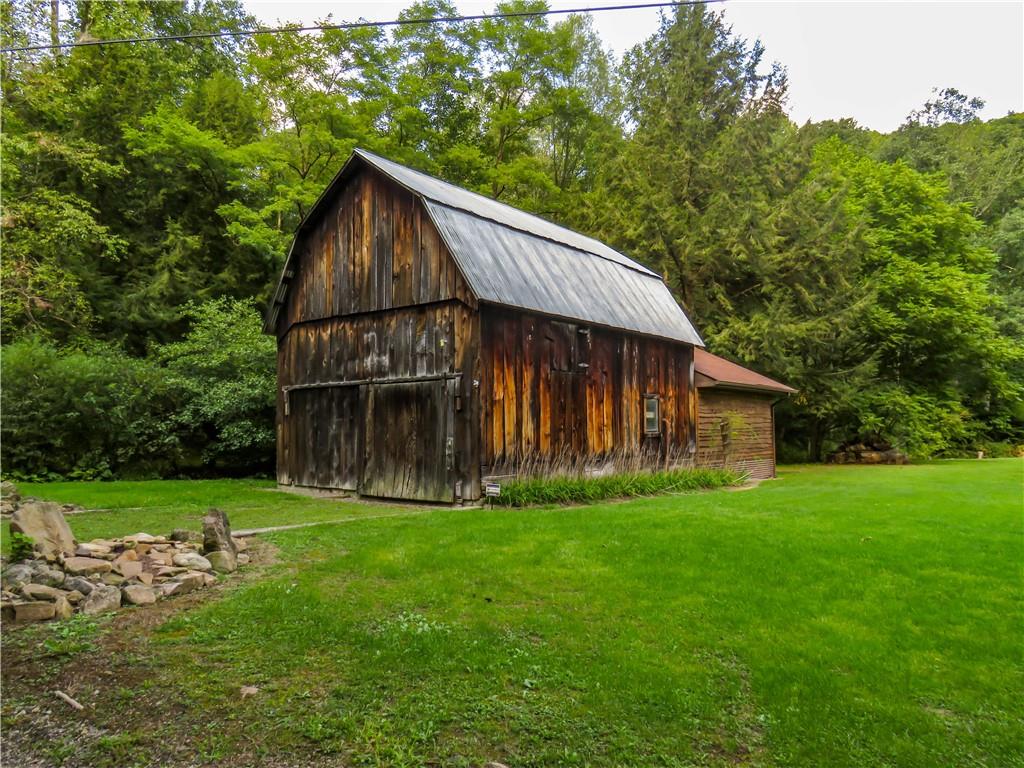 414 Dark Hollow Road Confluence, PA 15424 - Photo 21 of 25 a view of a house with a yard