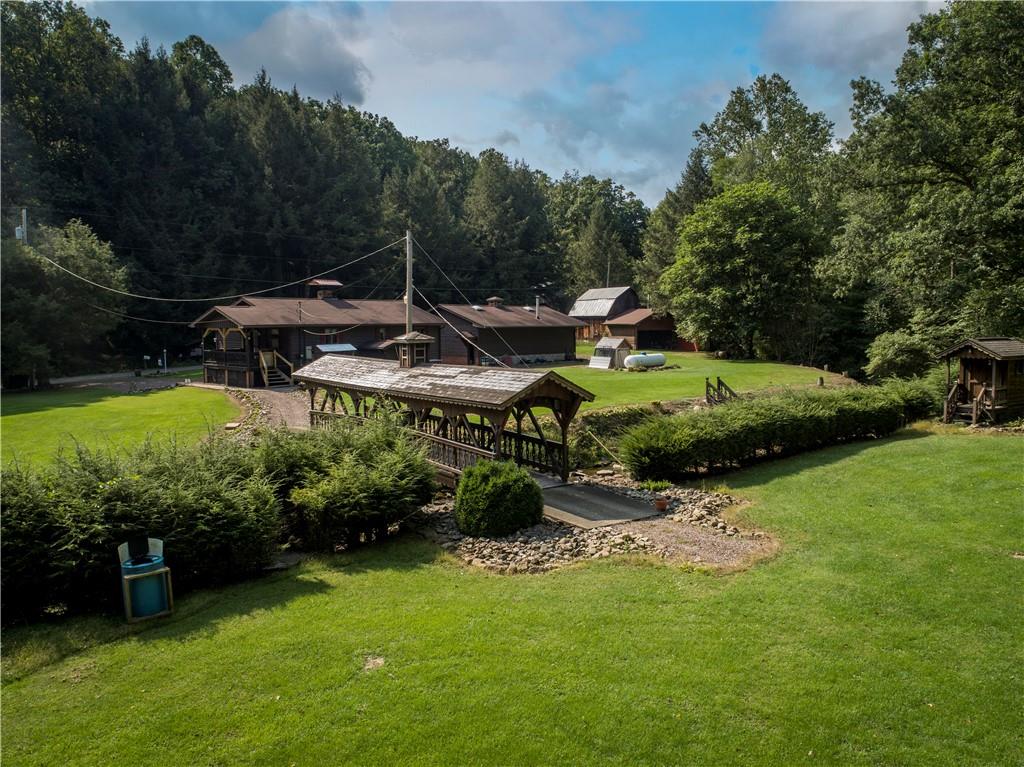 414 Dark Hollow Road Confluence, PA 15424 - Photo 24 of 25 a view of a garden with an outdoor seating