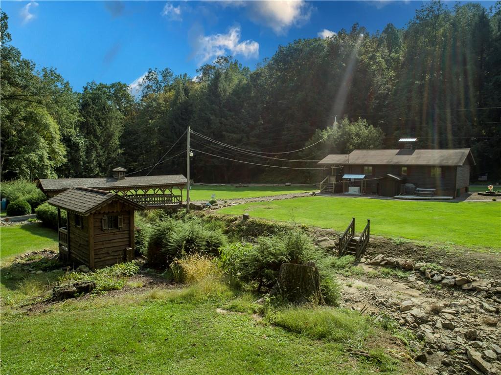 414 Dark Hollow Road Confluence, PA 15424 - Photo 25 of 25 a view of a house with a yard