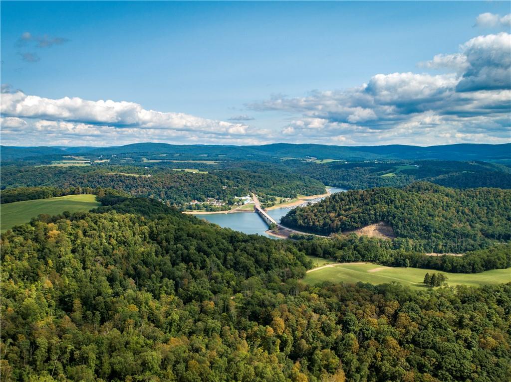 414 Dark Hollow Road Confluence, PA 15424 - Photo 4 of 25 a view of a lake with a city