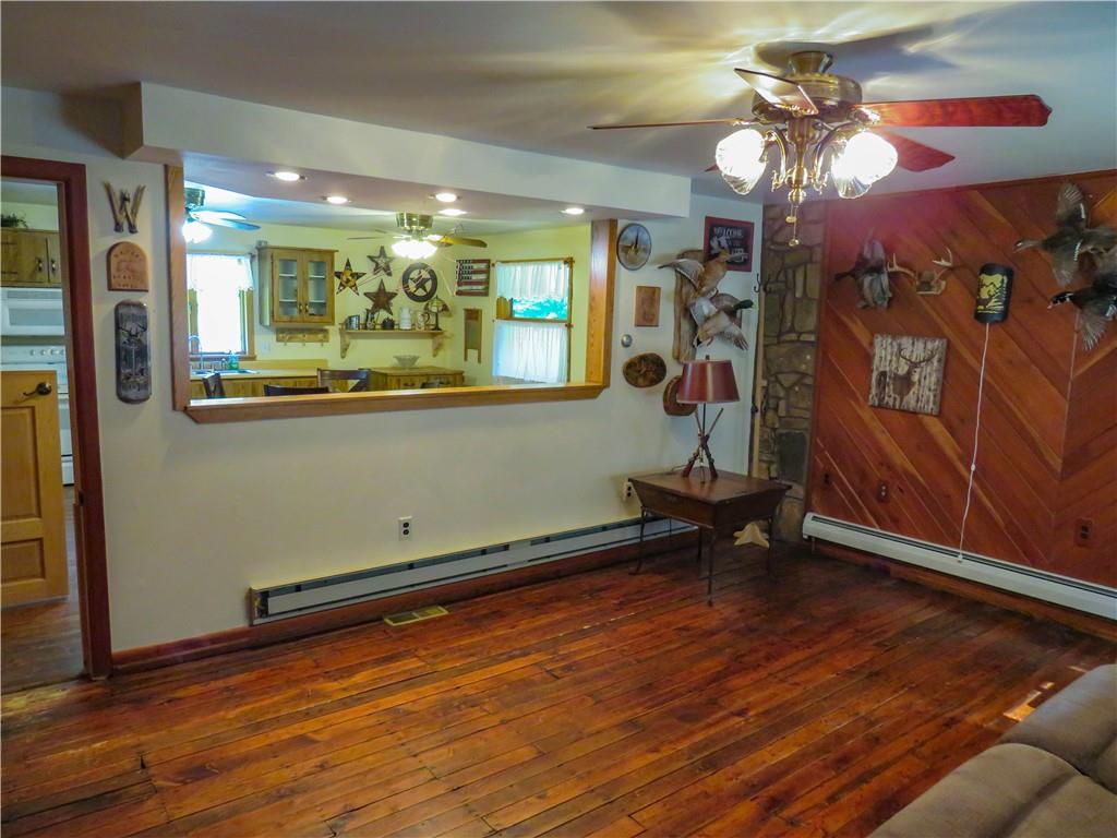 414 Dark Hollow Road Confluence, PA 15424 - Photo 6 of 25 a living room with furniture and wooden floor