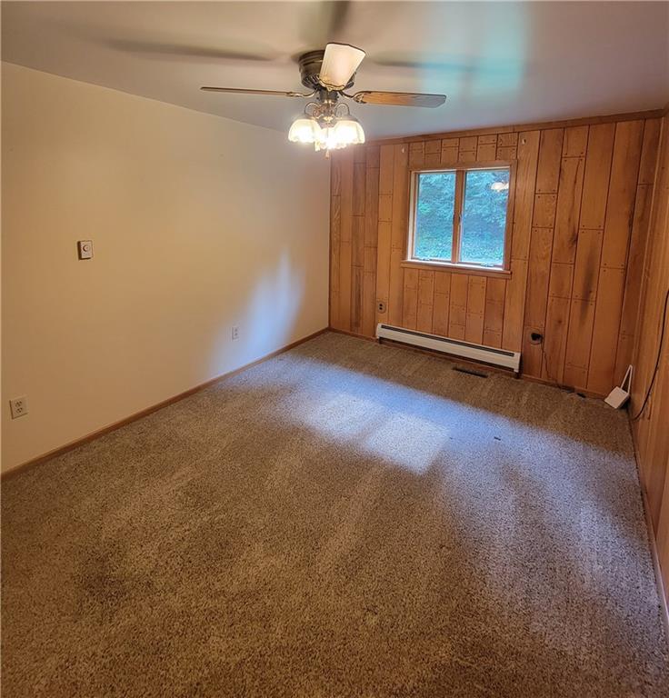 414 Dark Hollow Road Confluence, PA 15424 - Photo 9 of 25 an empty room with windows and fan