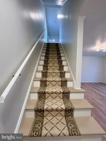 a view of entryway with wooden floor