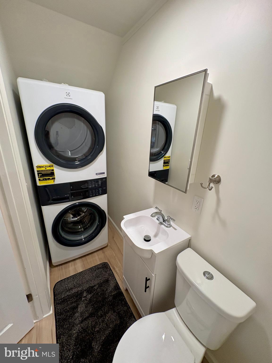 404 Front Street Port Matilda, PA 16870 - Photo 9 of 19 a bathroom with a toilet a sink and a mirror