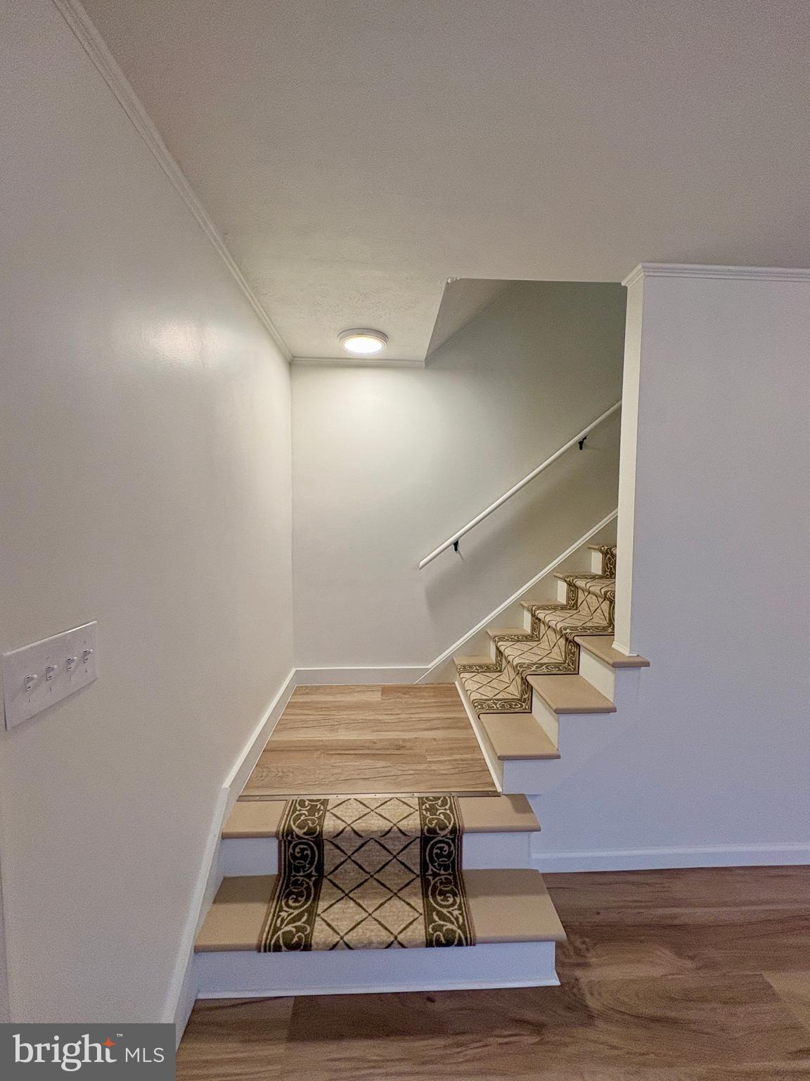 404 Front Street Port Matilda, PA 16870 - Photo 10 of 19 a view of entryway and hall with wooden floor