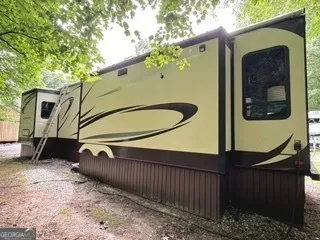 a view of a house with a park