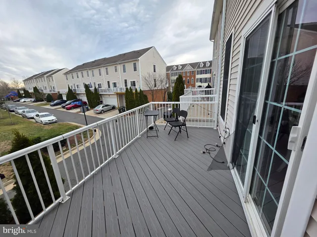 a view of balcony with furniture