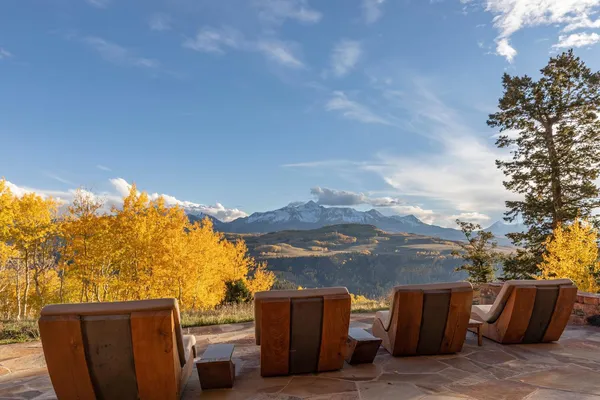 a view of swimming pool with a patio and a yard