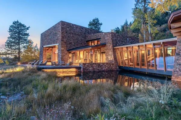 a view of a building with a yard