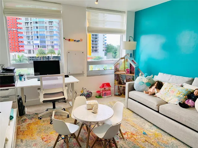 a terrace with outdoor seating and garden view