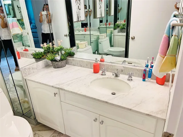 a view of a lake with a car parked