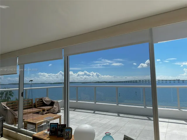 a view of a lake with a house