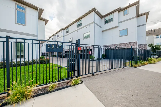 a view of a balcony with a garden