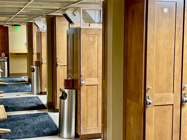 a view of a swimming pool with outdoor seating