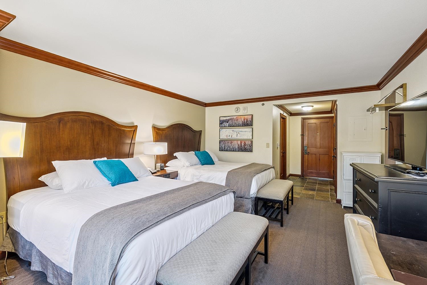 400 Resort Road, Unit 236 Olympic Valley, CA 96146 - Photo 9 of 25 a bedroom with double bed and a flat tv screen on dresser