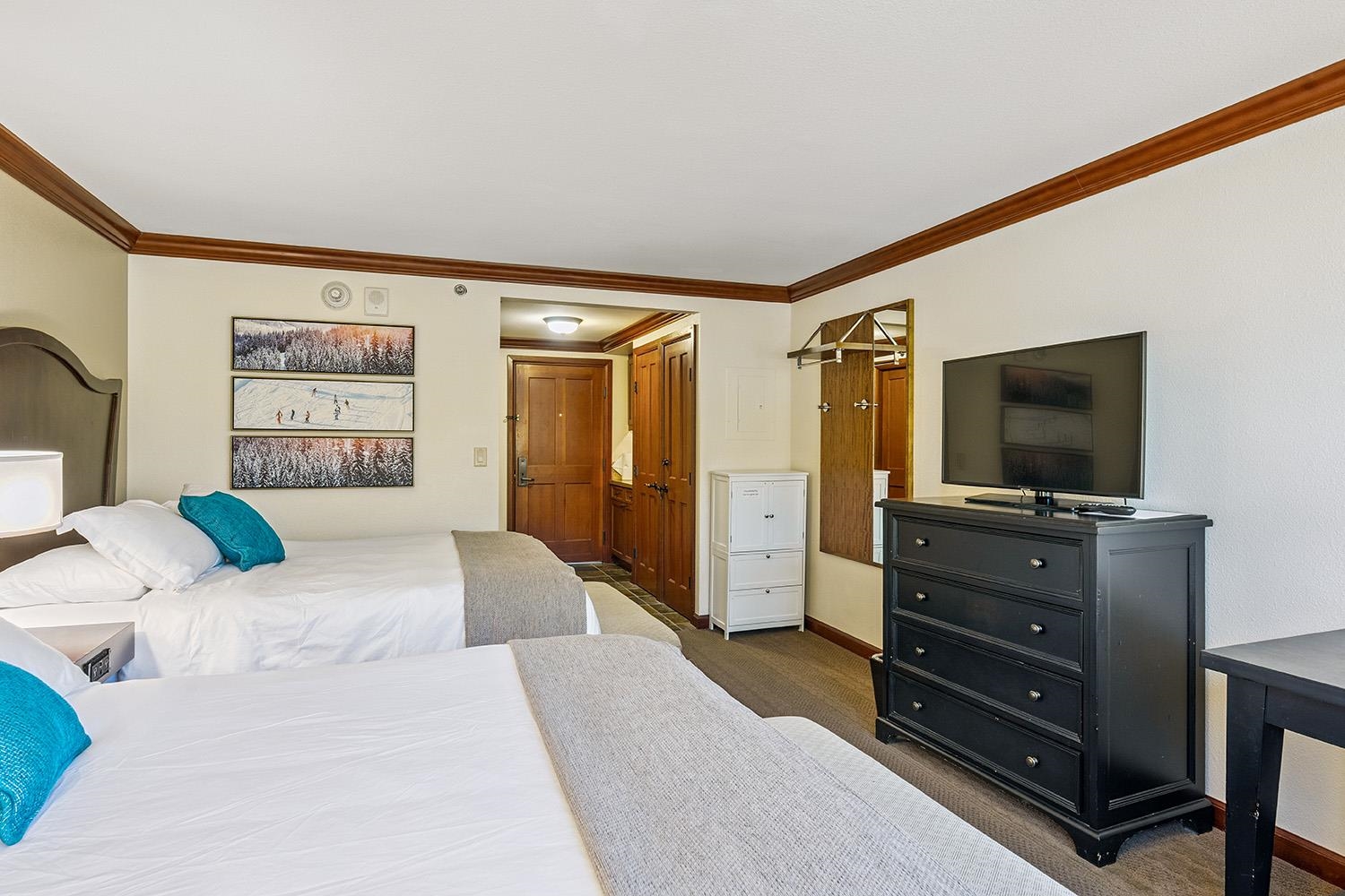 400 Resort Road, Unit 236 Olympic Valley, CA 96146 - Photo 10 of 25 a living room with furniture and a flat screen tv