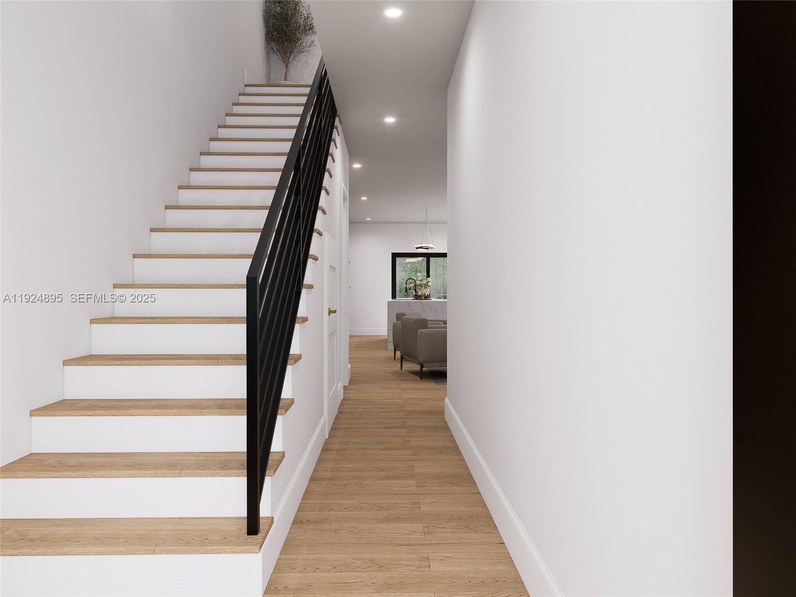 1818 Northwest 49th Street Miami, FL 33142 - Photo 12 of 16 a view of entryway and hall with wooden floor