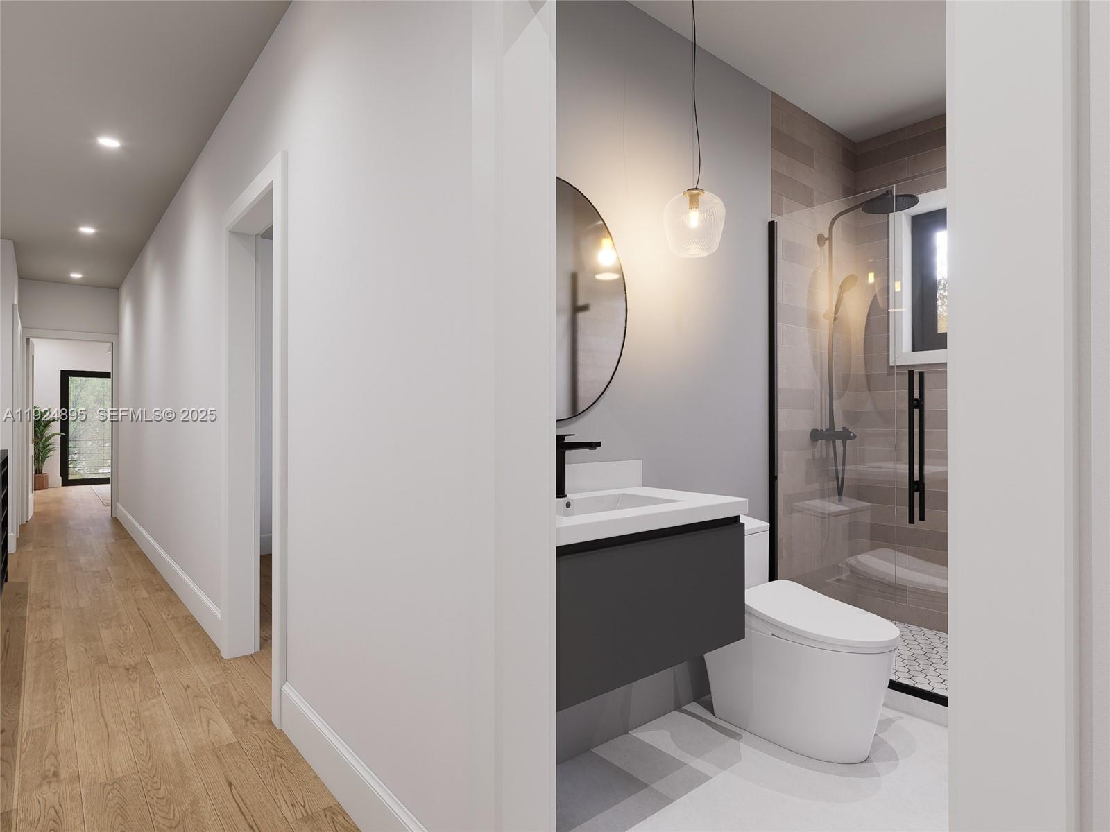 1818 Northwest 49th Street Miami, FL 33142 - Photo 15 of 16 a bathroom with a sink a toilet and shower