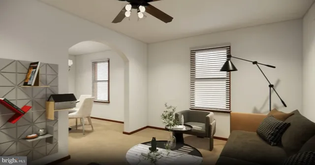 a living room with furniture and a window