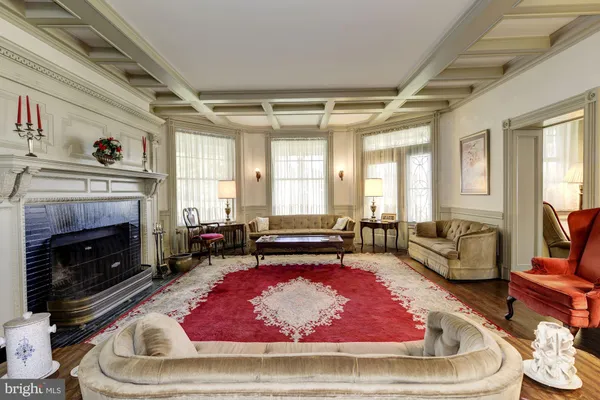 a view of a dining room with furniture and window