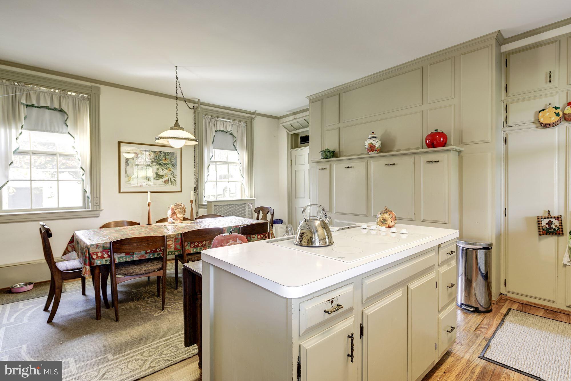 16449 Ed Warfield Road Woodbine, MD 21797 - Photo 28 of 102 a view of a kitchen area with furniture and window