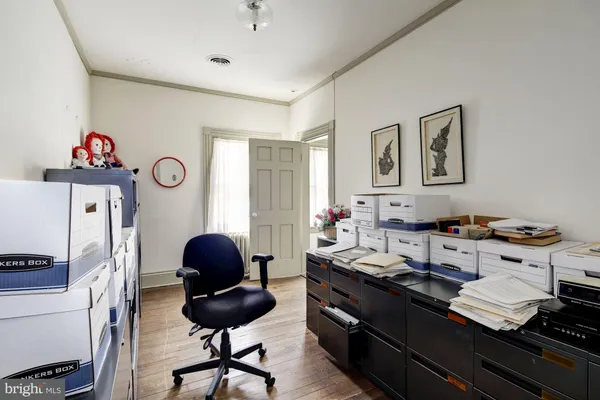 an aerial view of a house with a swimming pool