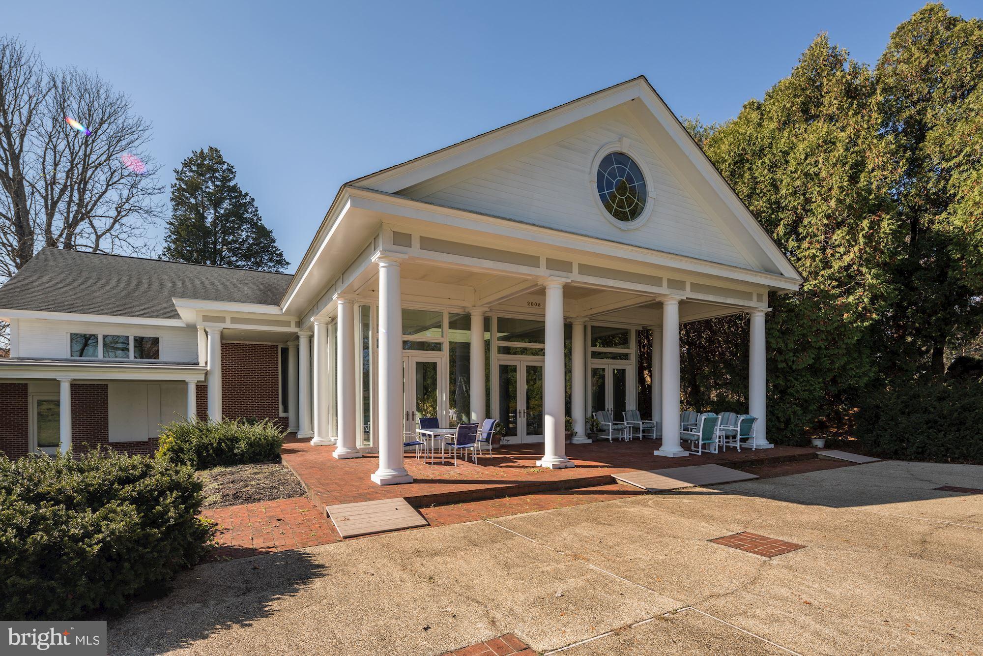 16449 Ed Warfield Road Woodbine, MD 21797 - Photo 58 of 102 a view of a white house with a outdoor space