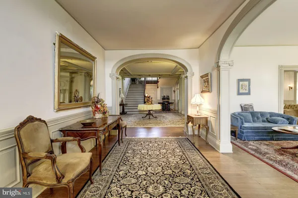 a view of a livingroom with furniture and a table