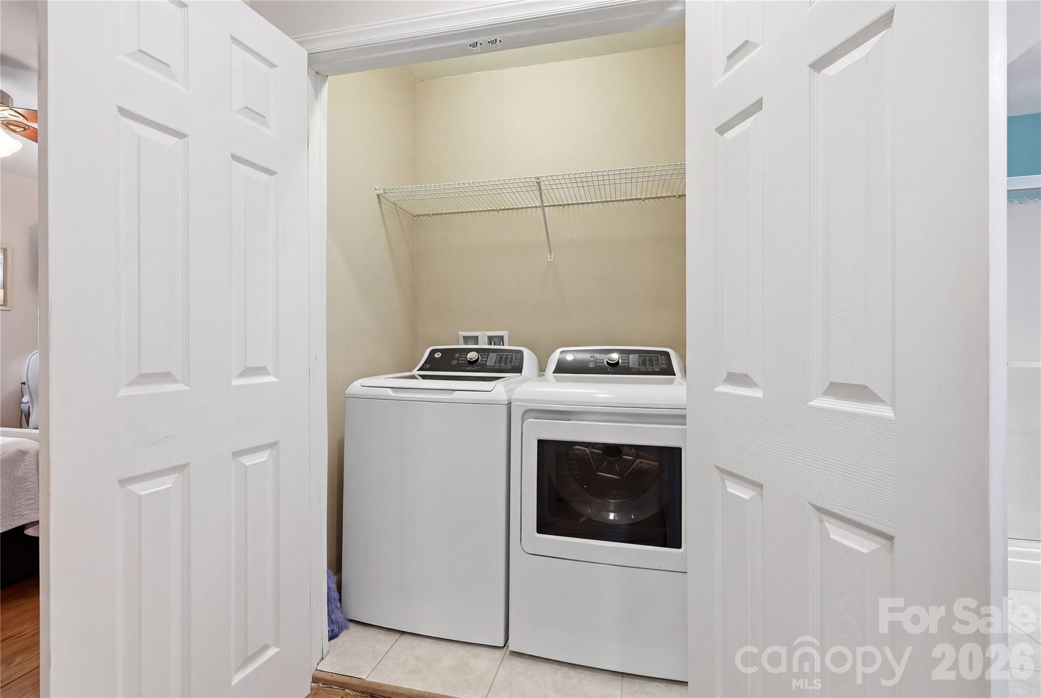 106 Maple Street Fort Mill, SC 29715 - Photo 23 of 44 a utility room with dryer and washer