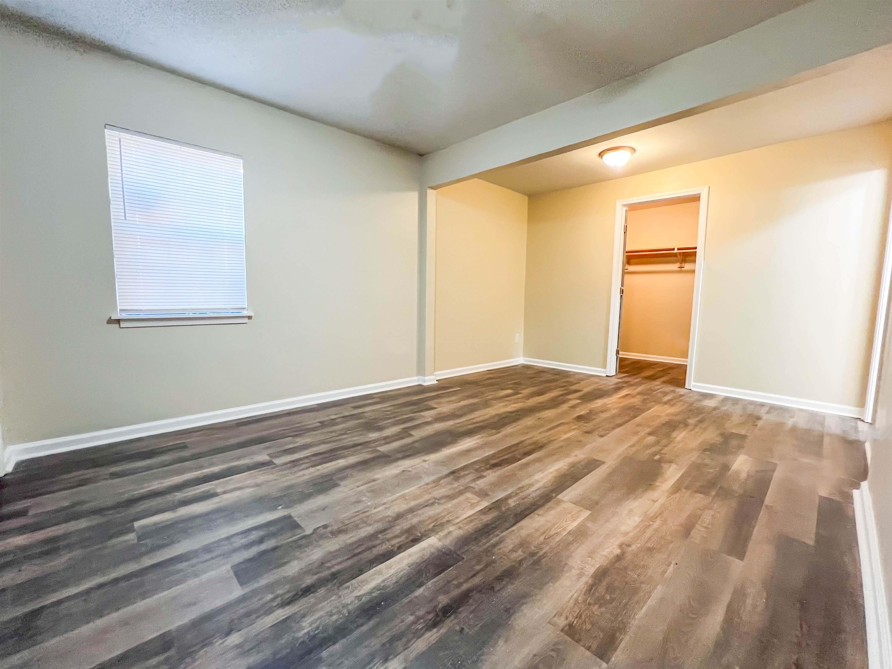 2491 Perry Road Memphis, TN 38106 - Photo 18 of 23 a view of empty room with wooden floor