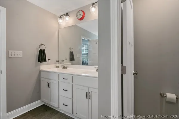 a bathroom with a shower and a bath tub