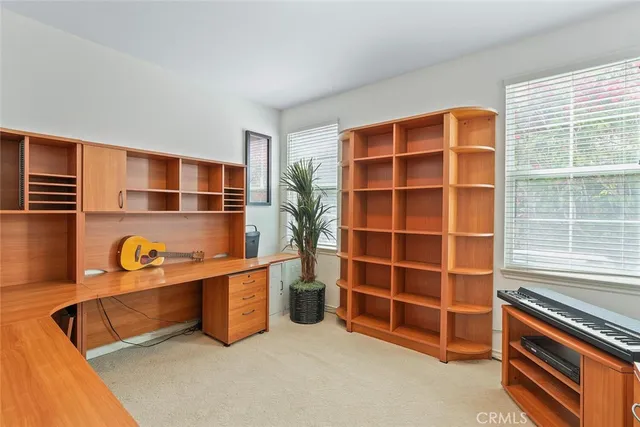 a spacious bathroom with a granite countertop tub and a sink