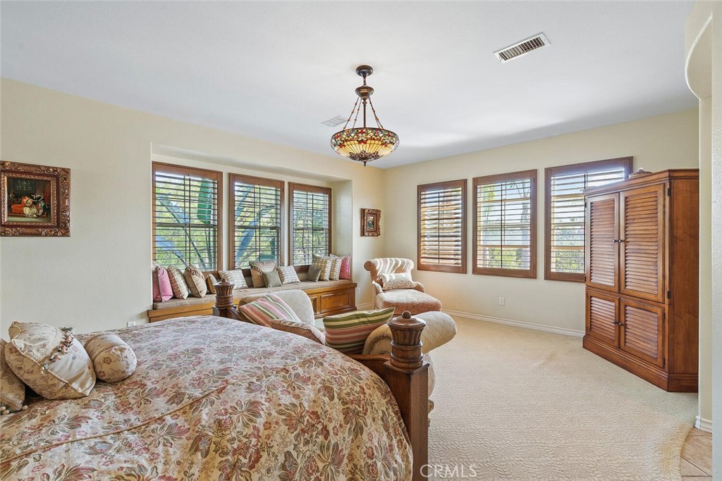 28 Malibu Irvine, CA 92602 - Photo 25 of 69 a bedroom with furniture and a large window