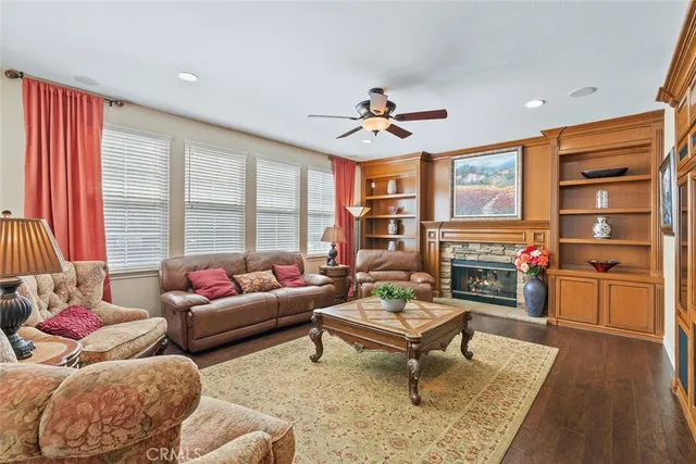 a very nice looking living room with a large window
