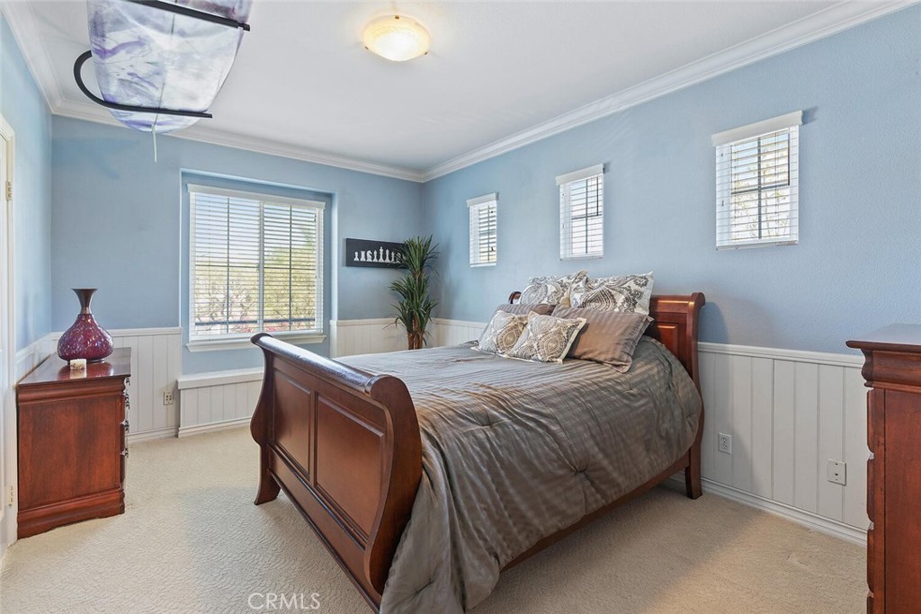 28 Malibu Irvine, CA 92602 - Photo 38 of 69 a bedroom with a bed and window